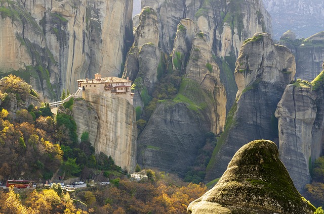A monastery sit high atop a rock in Meteora, Greece.